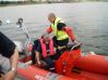 Me driving our boat from firestation